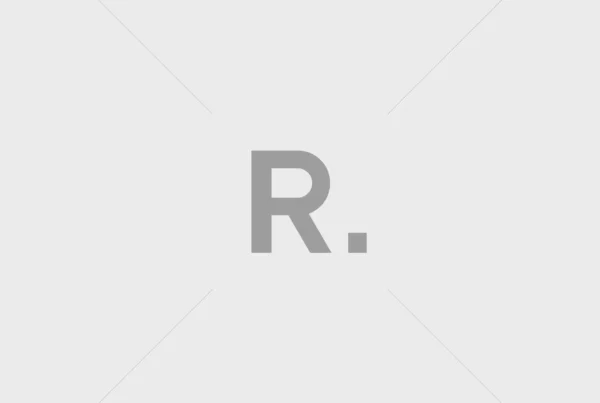 Platzhalterbild mit grazem Hintergrund und großem Buchstaben R als Symbol für Reiseagentur oder Reiseveranstalter
